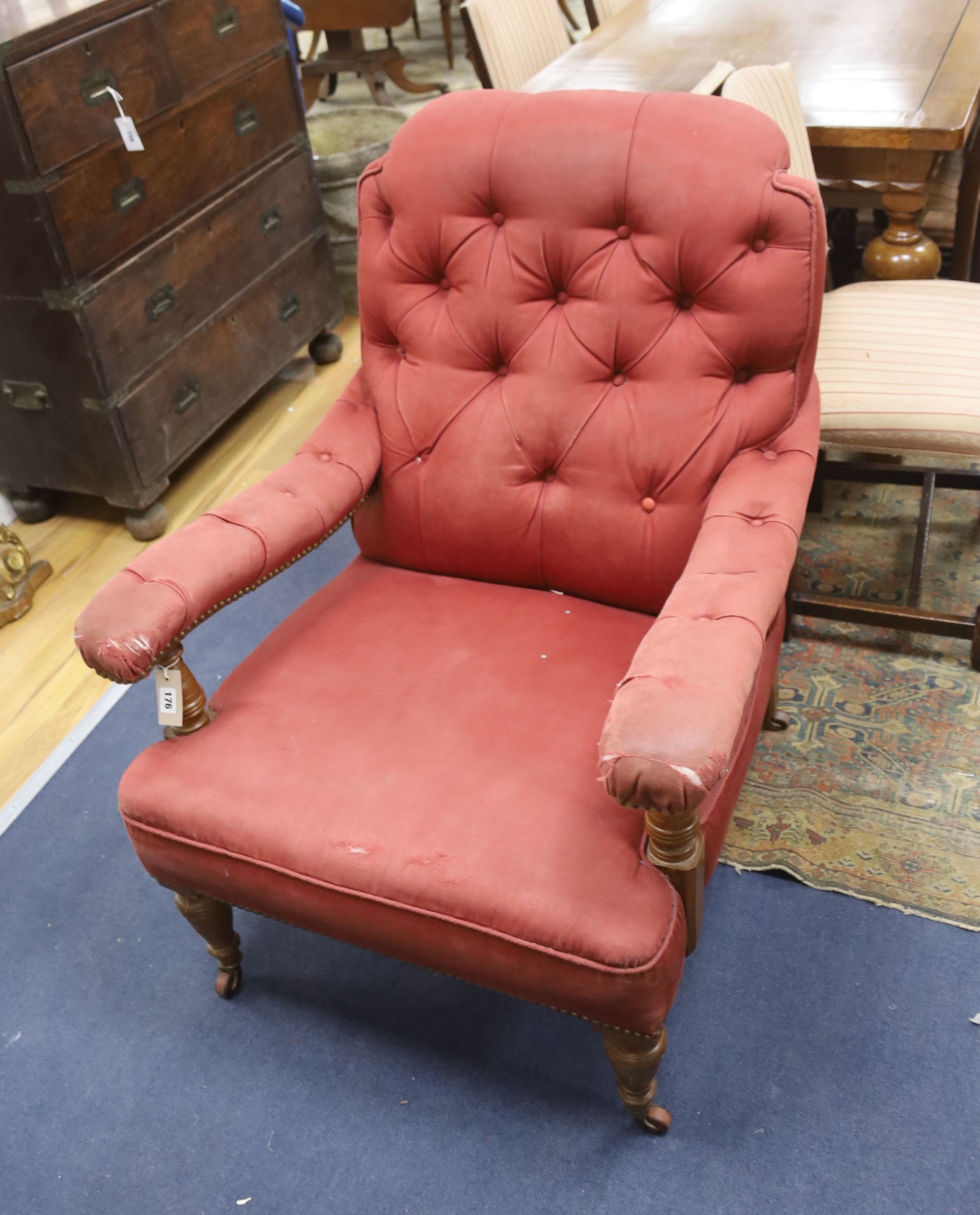 A Victorian oak upholstered open armchair, width 74cm, depth 84cm, height 98cm